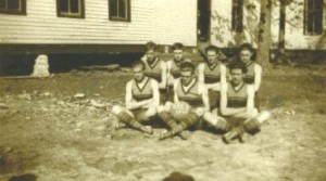 Flatwoods Basketball Team, 1923-1924   Karl Bastin is in the back row, far right with tree over his shoulder. This may have been taken about 1918 or 1919 before they went on to High School.